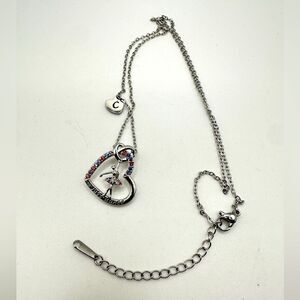 NIB Joycuff "Just dance" silver tone and rhinestone heart with dancer necklace!